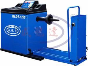 Equilibreuse de roues de camions